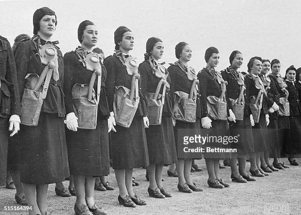 Rome, Italy: Fascist Women Parade For Il Duce. Fascist women, equipped with gas masks, are pictured as they took part in the parade of 70,000 women...