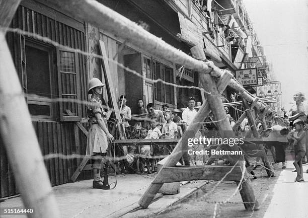 Japs 'Push' British Around in Shanghai. Shanghai, China: When Japanese soldiers tore down British barricades here and moved the British line 100 feet...