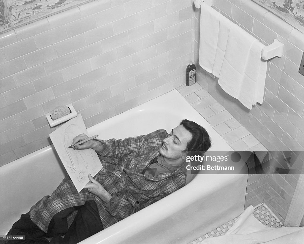 Salvador Dali Drawing in Bathtub