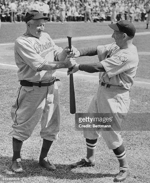 Honus Wagner and Eddie Collins, famous baseball old timers, choosing up for sides for the game between American and National League stars on...