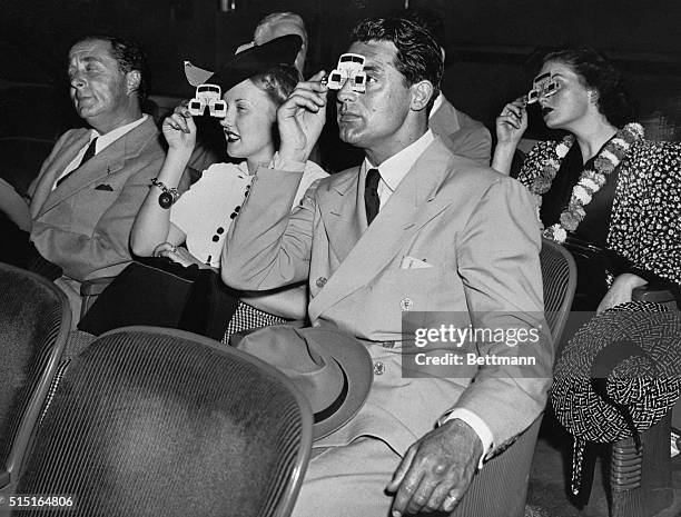 Cary Grant and Phyllis Brooks at the Polaroid movie in the Chrysler Building at the New York's World Fair.