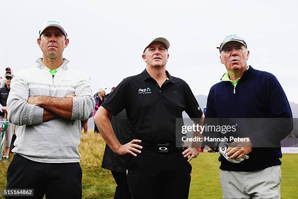 Former Australian cricketer Ricky Ponting, New Zealand Prime Minister John Key and former Australian cricketer Alan Border look on at the first tee...