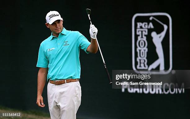 Bill Haas reacts as he chips in for birdie on the 15th hole during the third round of the Valspar Championship at Innisbrook Resort Copperhead Course...