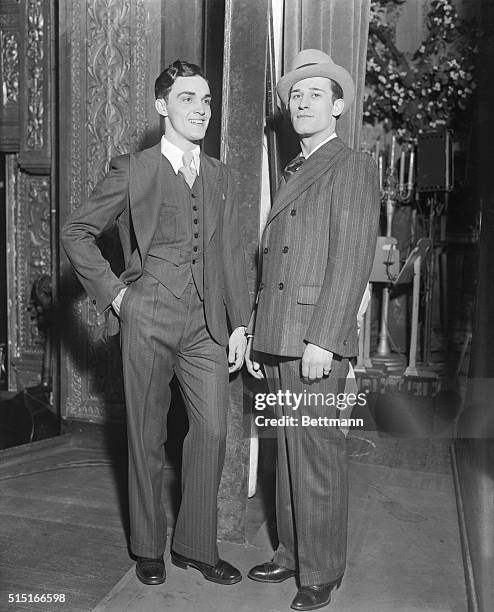 What the well dressed man will wear this fall. New York. J. Francis Lymon and Fred Kruger illustrating the novelty vests which feature the modes of...