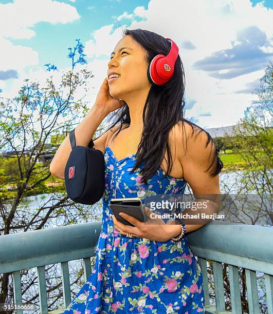 Brand Innovators Program Director Pearl Tam wearing NCREDIBLE1 Bluetooth Headphones as seen at Brand Innovators at SXSW on March 12, 2016 in Austin,...