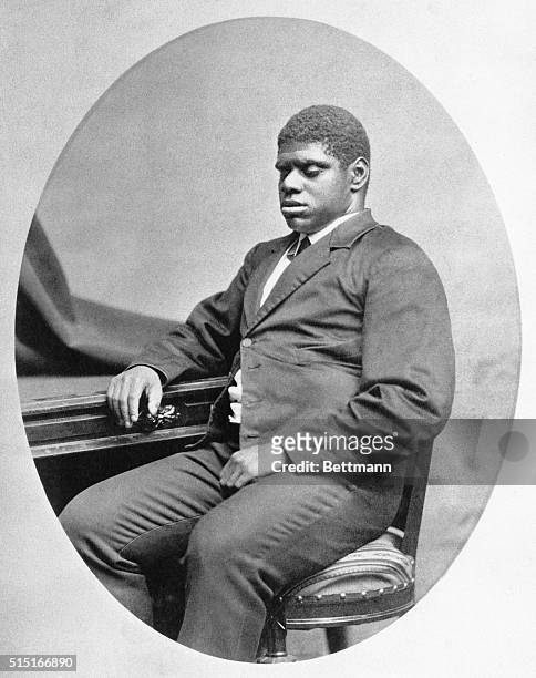 African-American pianist Thomas Wiggins, also known as Blind Tom Wiggins , sated at a desk, 1880.