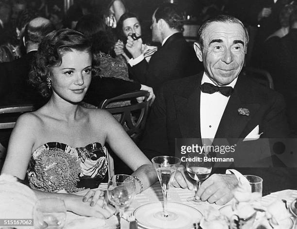 French Star and Producer at Night Spot. New York City: Simone Simon, French film star, and Lee Shubert, theatrical producer, in the Sert Room of the...
