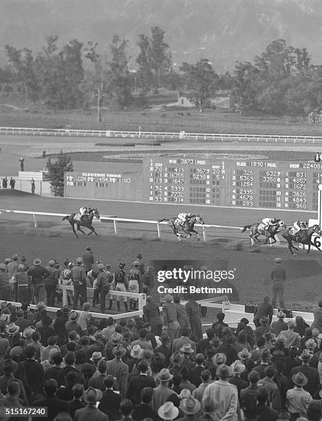 The 'Biscuit Back in the Money. Arcadia, Cal. Proving his right as a threat in the coming Santa Anita Handicap, Seabiscuit comes up to the finish...
