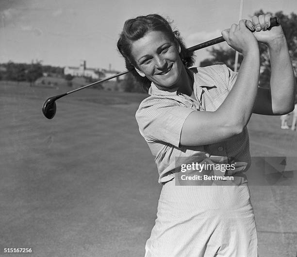 Mildred Zaharias, former Babe Didrikson, of Los Angeles, who is credited with hitting a golf ball farther than any other woman golfer, on the links...