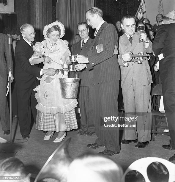 Aimee Semple McPherson celebrates her 49th birthday at Angelus Temple which she founded, here, dressed to illustrate her sermon " The Story of My...