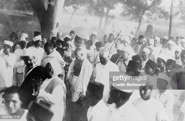 The rumble of revolt in India, with Gandhi in the lead...Stirring march of Indian rebels led by Mahatma Gandhi as it wound its way a distance of 200...