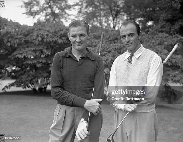 Harold "Jug" McSpaden, of Winchester, Massachusetts, who defeated Paul Runyan with Sam Snead, of Shawnee, Pennsylvania, who defeated Gene Sarazen, at...