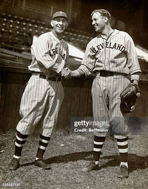 The reason for the broad smile on the face of manager Roger Peckinpaugh of the Cleveland Indians is shaking him by the hand. Wesley Ferrell most...