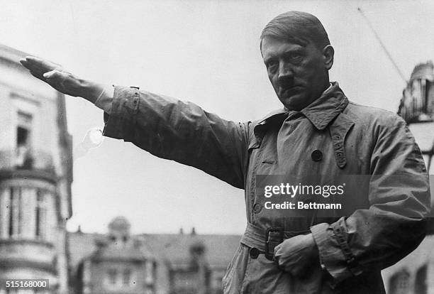 Picture shows Adolf Hitler extending his hands in the Fascist salute.