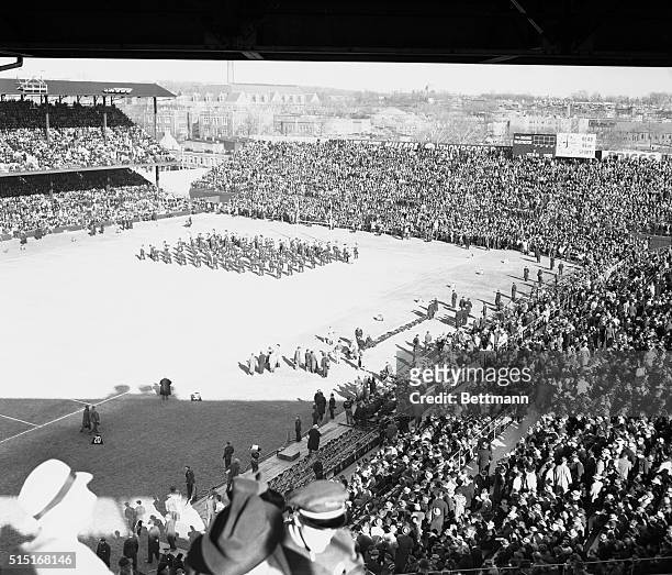 Part of the 36,034 spectators, mostly Washington supporters, who crowded into Griffith Stadium to see the Chicago Bears snow under the Washington...