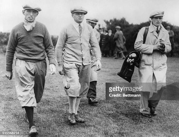 Tommy Armour, J. Jolly and a caddy at Carnoustie where Armour won the British Open.
