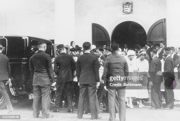 The funeral for Joseph Kahahawai, who was murdered by Thomas Massie. His mother and aunt are seen in white leaving the church. In September 1931,...