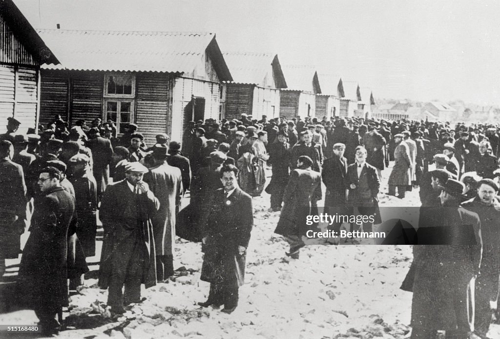 Prisoners at French Concentration Camp Inside Fence