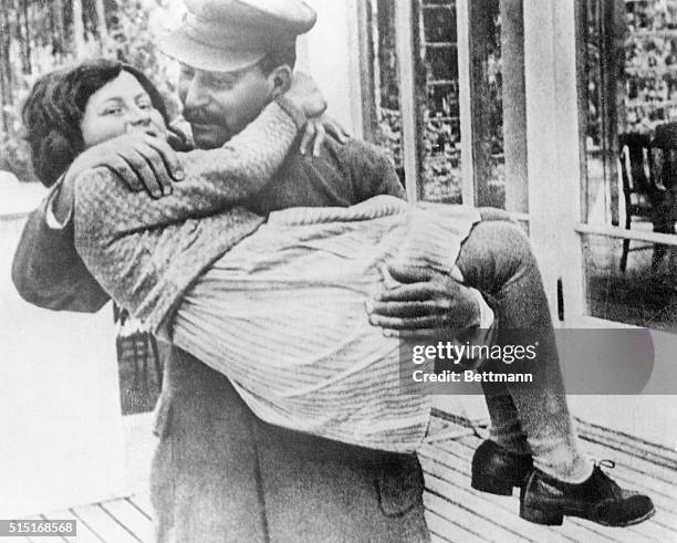 Here is a rare photo of Marshal Josef Stalin holding his daughter, Svetlana. The photo was made in 1937, at Stalin's country house in the suburbs of...