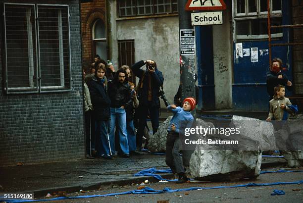 Belfast, Ireland: Funeral of Bobby Sands. Also miscellaneous shots of violence as a result of his death.