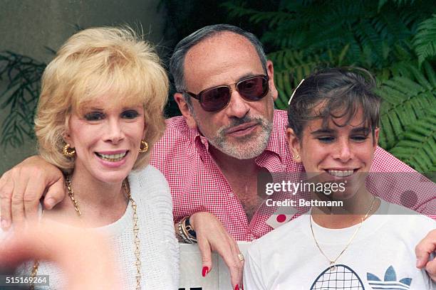 Joan Rivers poses with her husband Edgar and daughter Melissa at the "Joan Rivers Celebrity Tennis-Auction Classic".