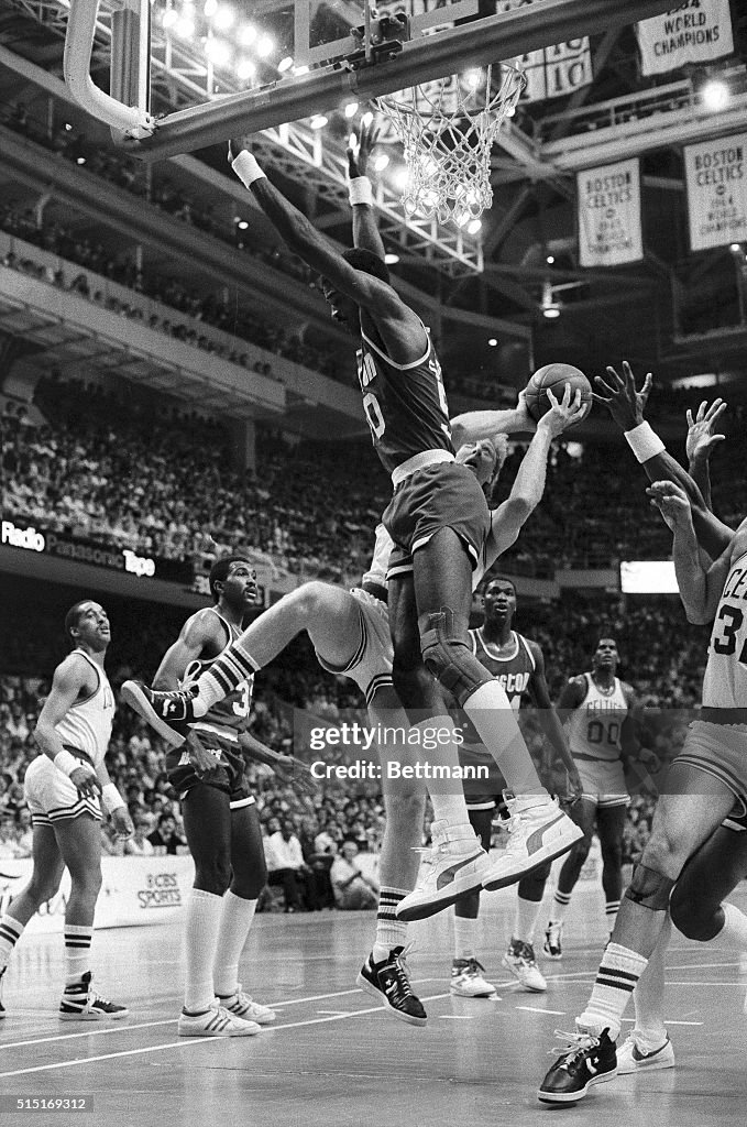 Ralph Sampson Blocking Larry Bird as He Goes for Shot