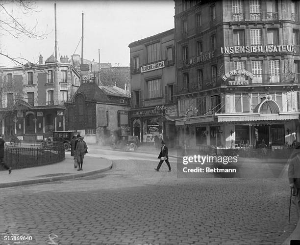The famous Place Pigalle in Montmartre with the Rat Mort seen on the right and the L'Abbaye on the left. It was ont he Mort that Harry K. Thaw and...
