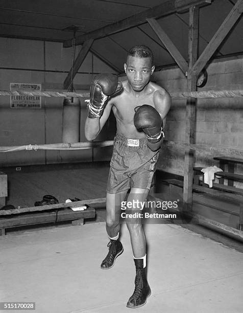 Summit, NJ- Full-length portrait of Sandy Saddler in the ring at the Summit, New Jersey training camp where he is preparing for his 15-round...