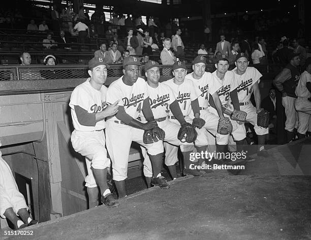 Members of the Brooklyn Dodgers who will be in the National League roster for the all-star game at Philadelphia on July 8 stand in front of their...