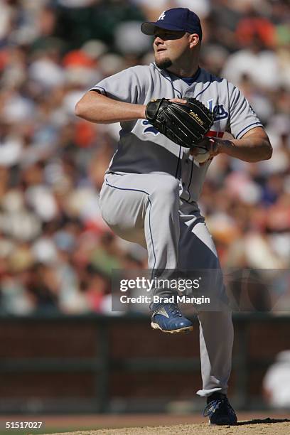 Pitcher Scott Stewart of the Los Angeles Dodgers pitches during the game against the San Francisco Giants at SBC Park on September 25, 2004 in San...