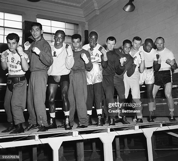Melborne, Australia- U.S.Olympic Boxing Team shown in group pose here before workout for the 1956 Olympic Games. From left: flyweight Ray Perez HI;...