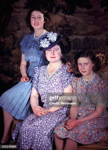 Queen Elizabeth and daughters Princesses Elizabeth and Margaret Rose. Photograph. BPA 2