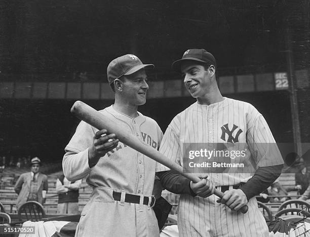 Mel Ott, , and Joe DiMaggio, respective sluggers of the New York Giants and the New York Yankees, pictured before the opening game of the World...