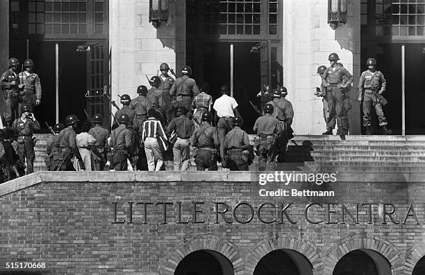 African American students who had previously been banned from Little Rock Central High School were provided with portal-to-portal protection to enter...