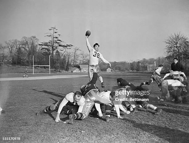 Green Bay Packers for Football Giants. New York City: Arnold Herber, holder of league record for passing, gets one off as the Green Bay Packers...