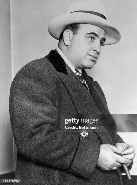 Gangster Al Capone wearing an overcoat in Chicago.