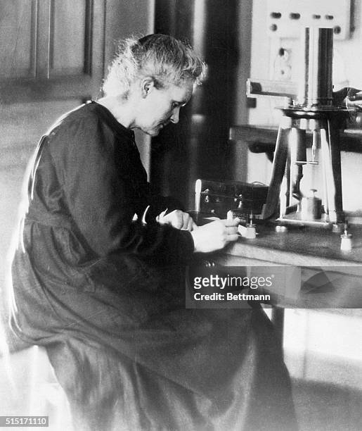 Warsaw, Poland- Marie Sklodowska Curie works in her Waesaw Laboratory. Undated photo circa 1920s.
