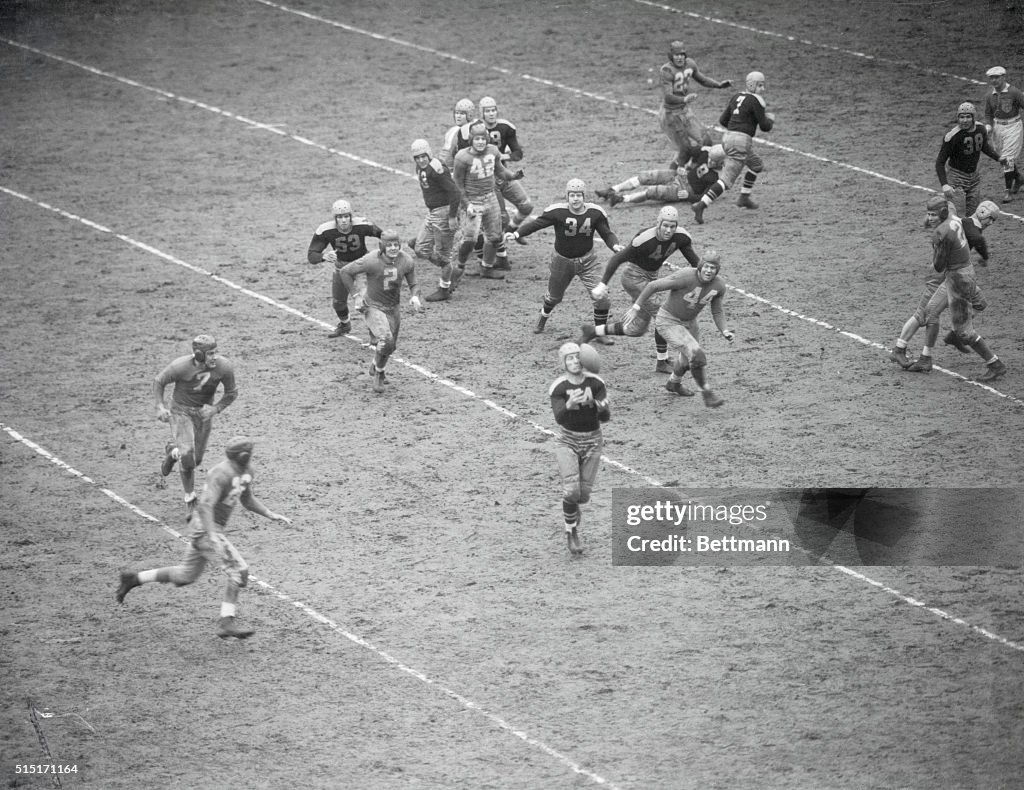 Don Hutson Trying to Catch Football