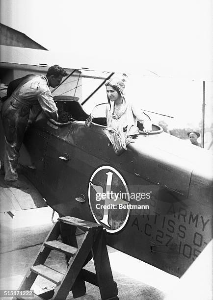 Charles and Anne Lindbergh in US Army Curtis plane.