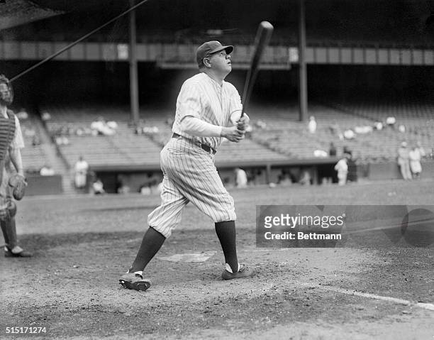 Yankees' champion player, Babe Ruth, demonstrating his batting style in 1929.