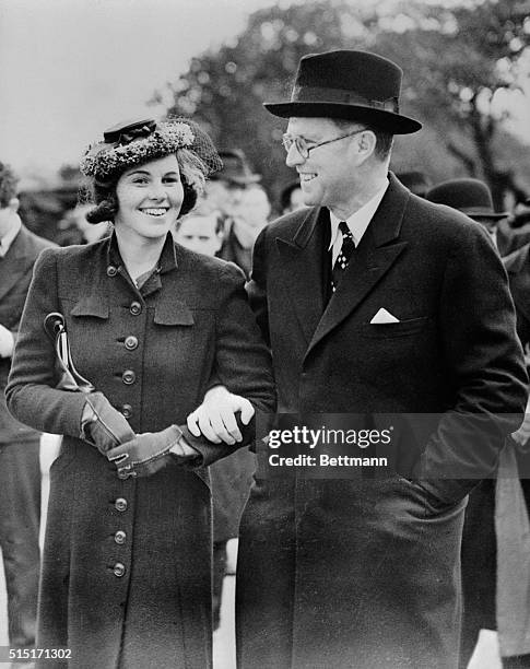 Ambassador to Great Britain, Joseph P. Kennedy, with his daughter Rosemary, as they watch Rosemary's brothers, Robert and Edward, officially open the...