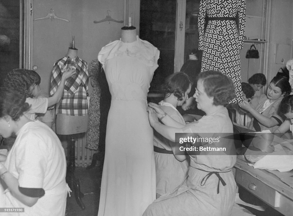 Seamstress Working on Gown