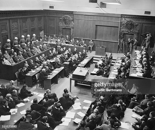 Nazi War Criminals Sentenced. Nuremberg, Germany: Defendants at the Nuremberg trial listen with varied expressions as their sentences are meted out...