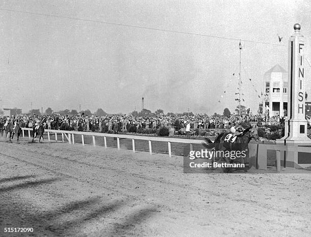 Whirlaway, ridden by Eddie Arcaro, wins the Kentucky Derby with eight lengths to spare. The 3-year-old set a new record of 2:01.4 for the Derby, and...