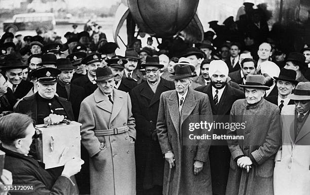 London, England- Indian Leaders on arrival after an invitation by the British Government at Heathrow Airport in London. Left to right: Mohammed Ali...