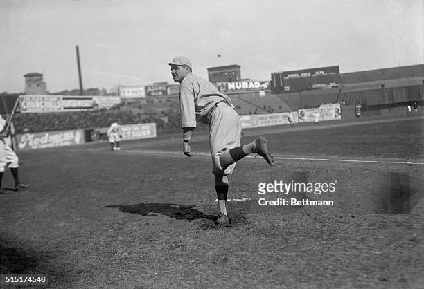 Babe Ruth, Boston Red Sox pitcher on the field.