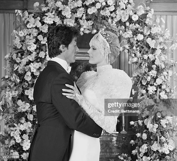 Sylvester Stallone and Brigitte Nielsen are photographed here immediately following their wedding ceremony at the home of Rocky producer, Irwin...