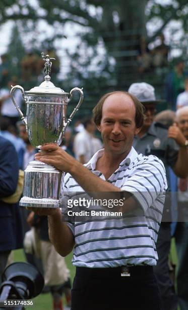 Oakmont, Pennsylvania: Larry Nelson holds the coveted trophy of the U.S. Open after his victory in the golf championship.