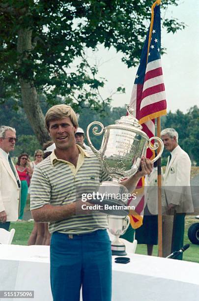 Pacific Palisades, California: Hal Sutton holds the PGA Championship trophy after he clinched the title with a score of 10-under-par 274 at Riviera...