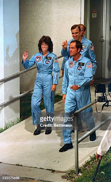 Astronauts Sally Ride , Robert Crippen , John Fabian, and Norman Thagard of the STS-7 head down the ramp during launch preparations for the Space...